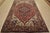 An authentic vintage traditional tribal Heriz rug hand-knotted with fine wool and natural dyes. This rug features a...