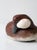 A vintage hand-carved and hand-painted canvasback duck decoy by Jim Gibbs, dated 1984, with a low, rounded form and a...
