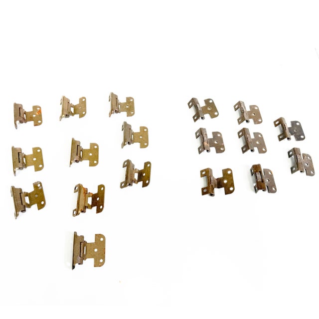Large lot of 18 vintage concealed/self-closing cabinet hinges in an antiqued brass-tone finish. These appear to date to...