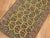 Very narrow finely woven one of a kind Persian runner with a navy paisley motif on a yellow field. Measures: 1'11" x 7'6".