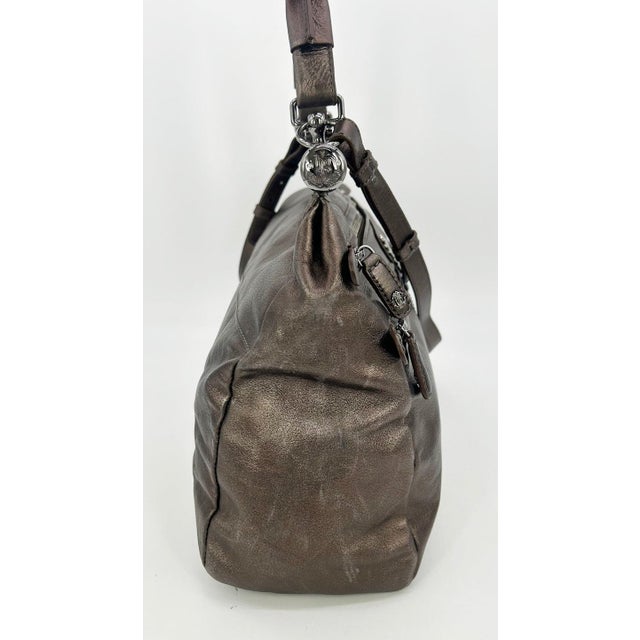 Roberto Cavali Metallic Bronze Leather Diva Bag in good condition. Metallic bronze leather exterior trimmed with gunmetal...