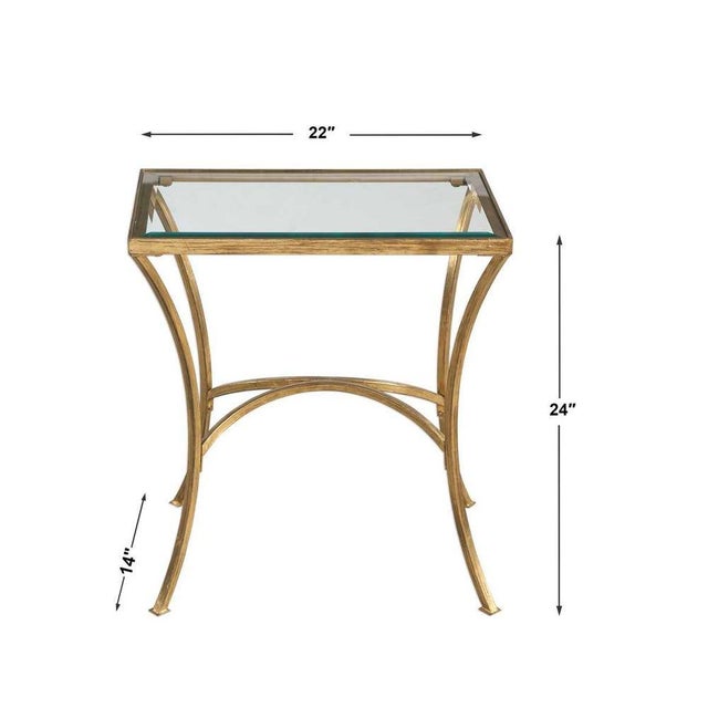 Gracefully arched hand forged iron finished in heavily antiqued gold leaf. Top is clear beveled tempered glass. Newly...