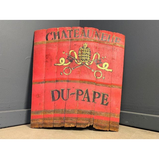 Cool wooden decorative wall hanging made from a chateauneuf du pape grape hod bucket that was inconplete. This has...