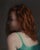 Portrait in Green by Kelly Birkenruth | Oil on Panel Portrait of a woman with red hair in a green top. For Sale