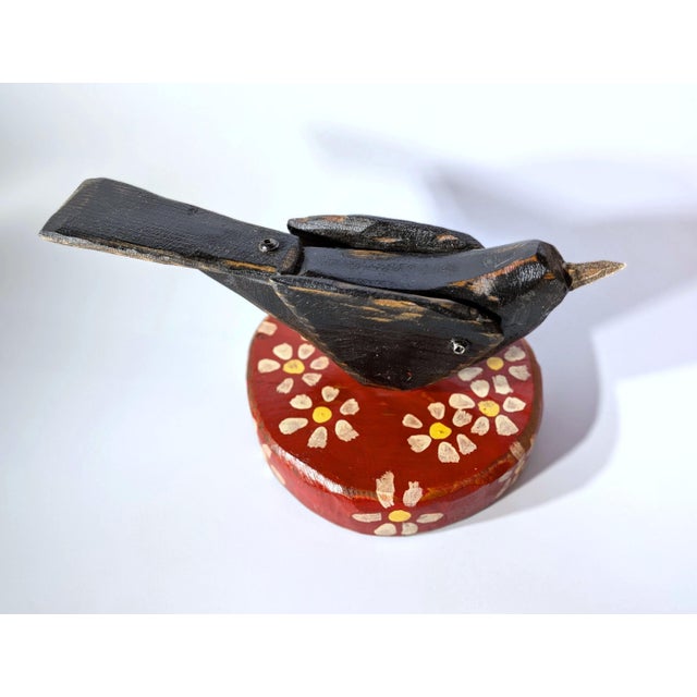 New, original contemporary folk art from Mikel Davison. This rustic, hand-crafted little black bird sits on a daisy-...