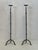 Brutalist iron floor candle holder. Its minimalist design, featuring a stable base and ethnic influences, makes it a...