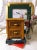 This vintage small chest of drawers bamboo coffee bar station showcases a classic mid-century geometric silhouette...
