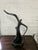 A striking example of retro minimalist art. This sleek, mid-century modern (MCM) style ceramic sculpture features a highly...