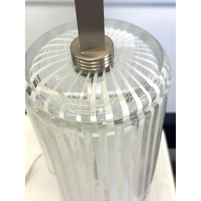 Contemporary majestic Murano glass table lamps. Transparent blowing glass with milky-white “canne di filigrana” filigree...