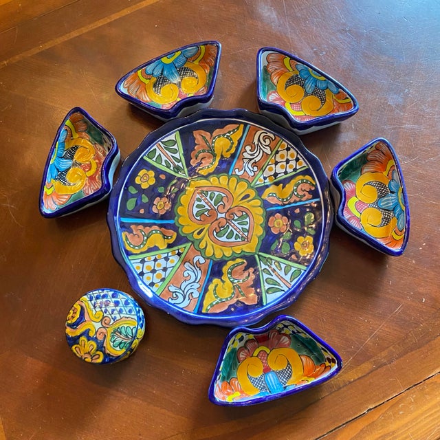 Handcrafted and hand painted Mexican Talavera pottery appetizer tray set. This set features hand-painted floral patterns...