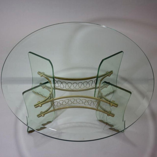 Luigi Brusotti Glass and Brass Table made in Italy around 1950. A rare crystal occasional table featuring four very thick...