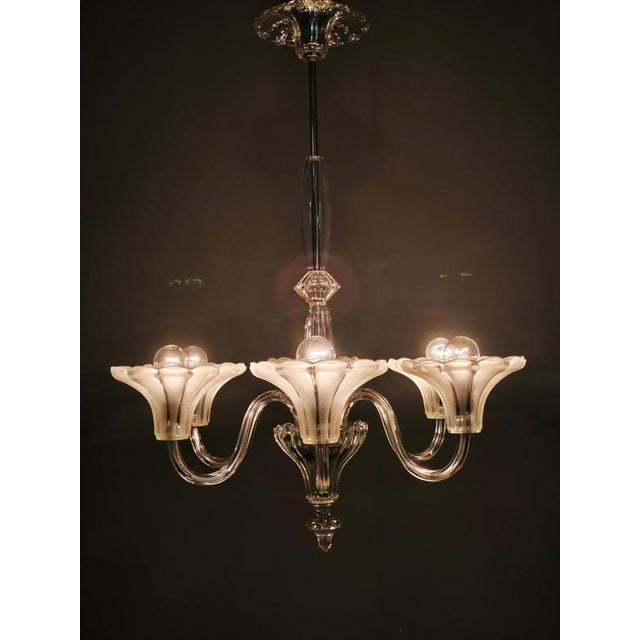 An exceptional large six-arm art deco glass chandelier, produced in czechoslovakia during the 1930s. This highly...