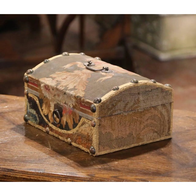 Blending antique textile artistry with sculptural design, this decorative jewelry box is a distinctive creation by French...