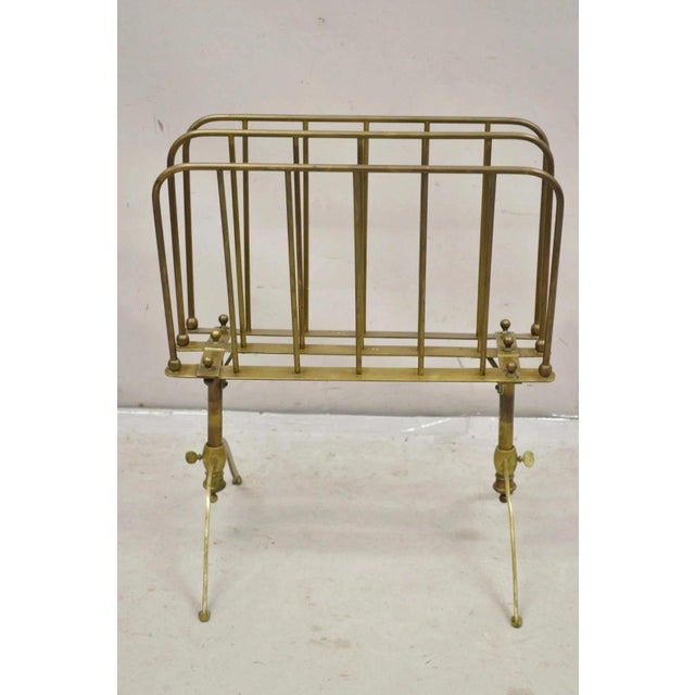 Vintage A. Ravenel Paris French Mid Century Modern Brass Magazine Rack Stand. Circa Mid 20th Century. Measurements: 23-26"...