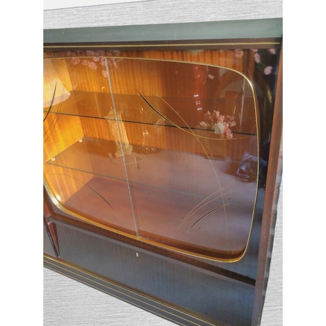 An extremely rare German Mid Century modern dry bar or entertainment cabinet by Qualitasmobel. The cabinet is literally...