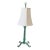 Decorative table lamp featuring an aged patina of verdigris-green finish, sculptural three-footed neoclassical base,...