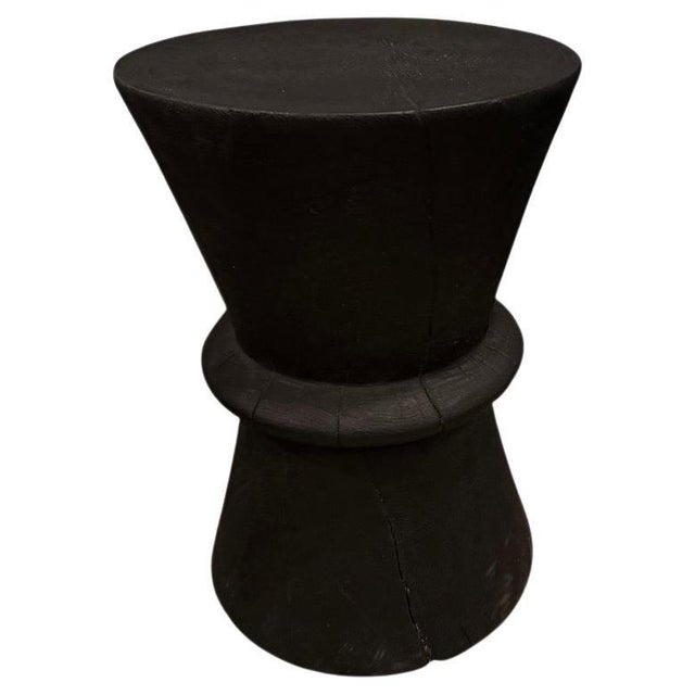 Beautiful minimalist hand carved reclaimed suar wood side table. Charred, sanded and sealed revealing the unique wood...