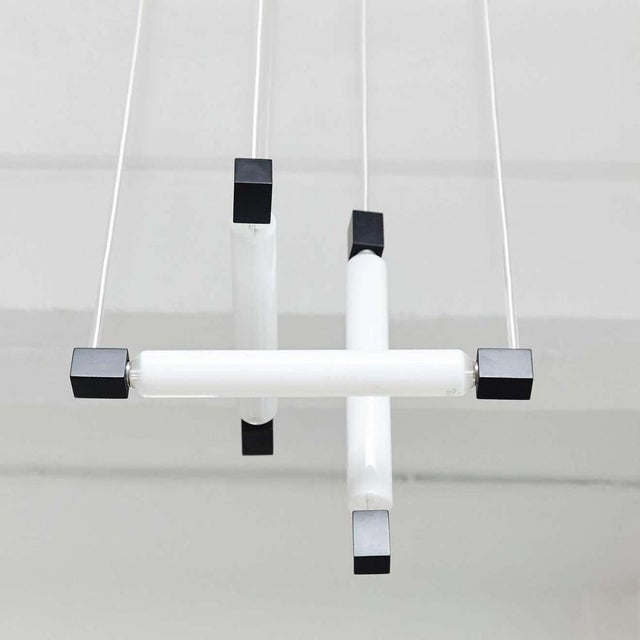 Hanging lamp, designed in the style of Rietveld, executed circa 1960 by unknown manufacturer. Painted wooden structure and...