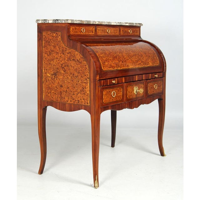 Very rare cylinder bureau with oyster veneer france plum wood, buckthorn around 1770 dimensions: h x w x d: 111 x 100 x 51...