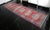 Vintage 1970s distressed Turkish Oushak rug runner. With red field and shades of green, dark gray and blue throughout....