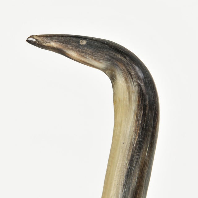 Exquisite unique Inuit Sculpture (unsigned) of a crane made from muskox horn and perhaps a bone base? Original price tag...