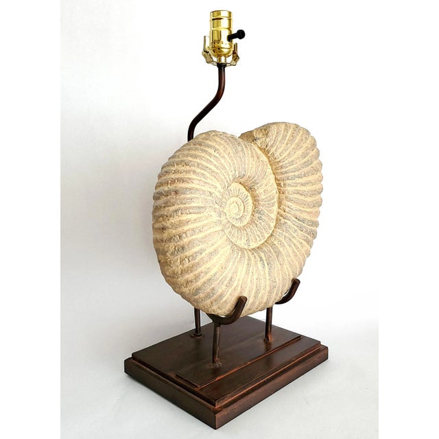 Offering a LARGE vintage plaster faux ammonite snail fossil table lamp, circa 1980s. This lamp was restored with a New...