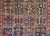 A wonderful early 20th century Persian Bakhtiari rug with a hand-woven patchwork pattern with myriad cypress trees and...