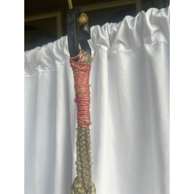 I’m thinking a real history buff might make this historical brass piece into a lamp, in a bookcase or use it as a paper...