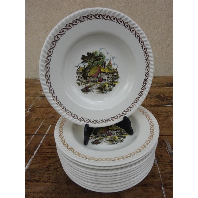 Set of 11 Lunéville earthenware soup plates. Made in Lorraine, France, between 1892 and 1923 by Keller & Guérin. Each...