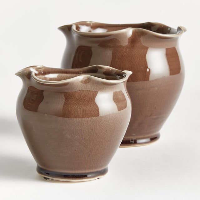 What makes these pots unique is the deepBrown glaze. The ruffle rim detail at the top adds a feminine touch. The perfect...