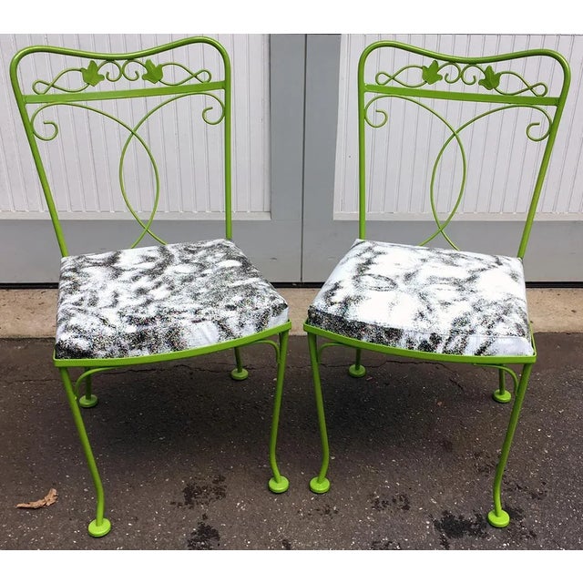 Not your mother's patio chairs. Pair of upcycled chairs. Vintage metal frames painted bright green and re-upholstered with...