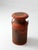 A vintage mid century milk can with a weathered red painted finish and naturally aged patina throughout. The classic dairy...
