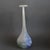 Free-blown Murano glass bottle / vase with a bulbous ovoid body which rises to a long, tapering neck and an asymmetrical,...
