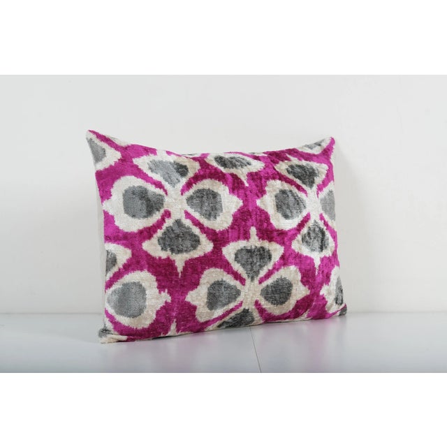 Fuchsia Silk Ikat Velvet Pillow Cover -Luxurious cushion cover of handloomed ikat fabric -Insert is NOT included -Color:...