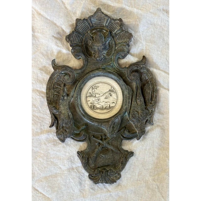 Interest boat hunt themed 19th century Belgian clock face repurposed as a frame for a 16th century symbolic engraving by...