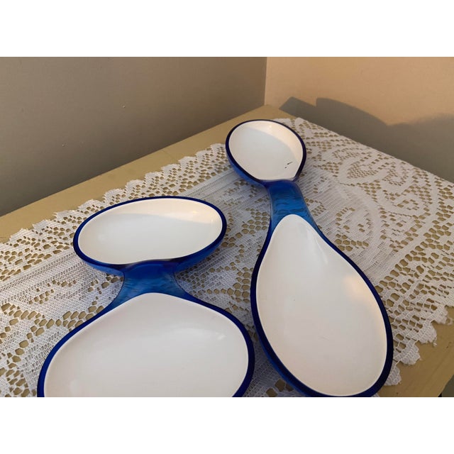 Add a splash of vibrant, space-age modernism to your next gathering with this iconic vintage two-piece interlocking...