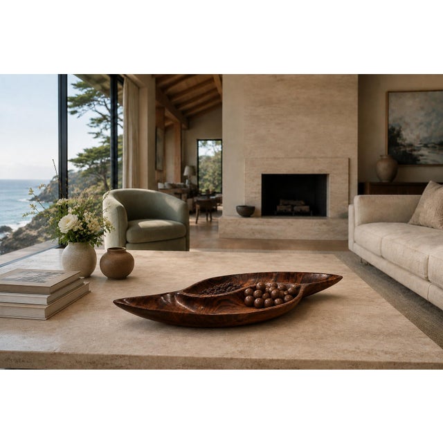 Handcrafted in Brazil from a single block of solid jacarandá—Brazilian rosewood—this sculptural platter embodies the...