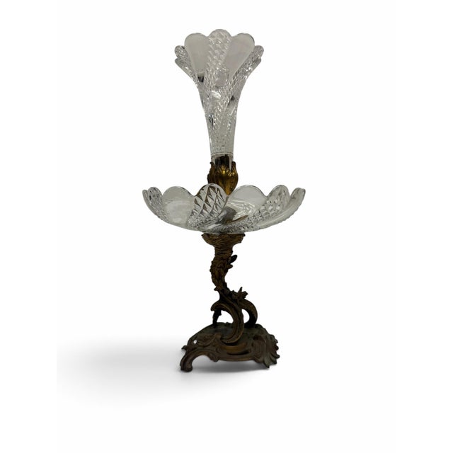 Add magnificent, historic grandeur to your home with this 19th-century French ormolu and cut crystal epergne centerpiece....