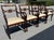 English Regency set of four wood dining room chairs with scrolled bulbous crest rails, scrolled arms, brass foliage...