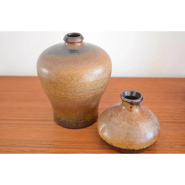 Studio ceramic vases set of 2 from the workshop of Elke & Elmar Kubicek Münstermaifeld. The ceramics has a natural glaze...