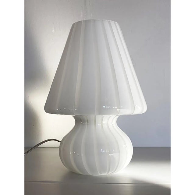 Elegant milky-white striped murano glass table lamp contemporary and effective table lamo. A piece of hight italian...