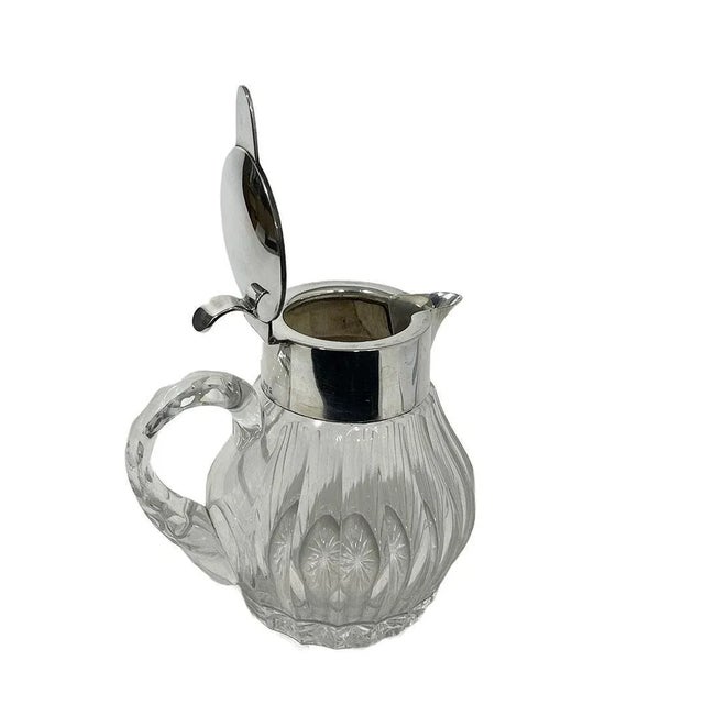 Gebrüder Deyhle, Schwabisch Gmund, early 20th century Silver mounted cut-glass pitcher Silver mounted cut-glass pitcher in...