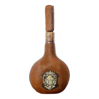 Vintage Hollywood Regency Italian Hair-on-Hide Decorative Decanter With Heraldic Brass Crest For Sale