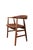 Elegant armchair in dark teak from Farstrup Møbelfabrik, Denmark, where every detail feels well thought out. The coil-...