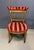 A decorative giltwood side chair made in France during the Napoleon III period, drawing on Louis XVI vocabulary — fluted,...