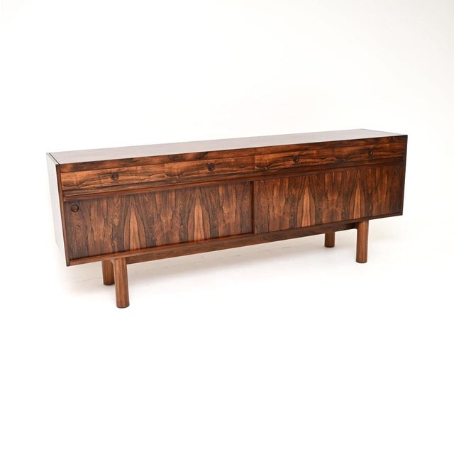 A stunning vintage sideboard by Robert Heritage for Archie Shine. This was made in England and originally retailed by...
