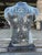 The ancient Egyptian magical statue, a solid marble bust from the 21st century, features intricate hydrographic elements...