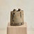 A 1960s ceramic vase crafted by the renowned Faenza Art Institute (F'Arte). This textured piece features an abstract,...