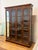 Design Plus Gallery presents a Vintage Display China Cabinet from Henredon. The cabinet is constructed from woods with...