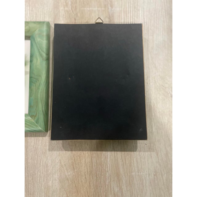 These two framed Capodimonte porcelain plaques feature three-dimensional floral designs. Capodimonte is a type of Italian...